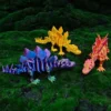 3D dinosauři měnící barvy, prostorové modely zvířat a stylové interiérové figurky